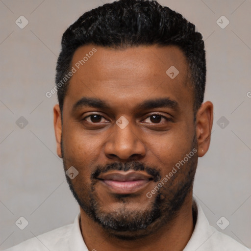 Joyful latino young-adult male with short  black hair and brown eyes