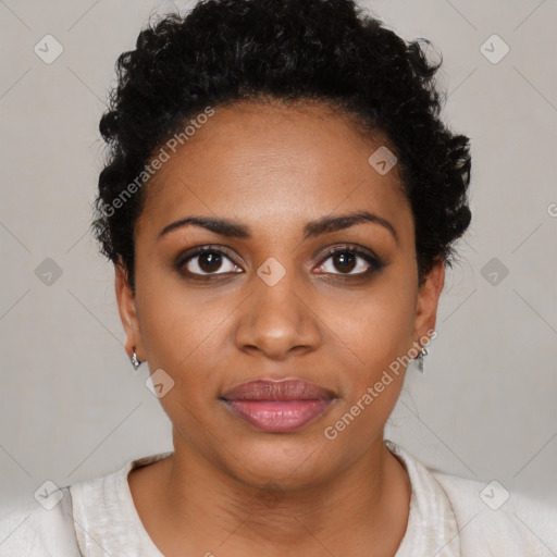 Joyful black young-adult female with short  black hair and brown eyes