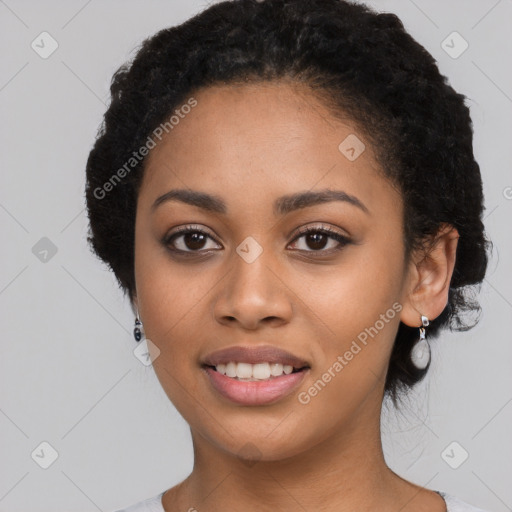 Joyful latino young-adult female with short  black hair and brown eyes