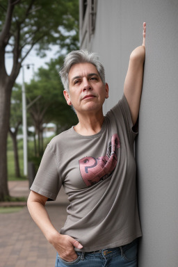 Paraguayan middle-aged non-binary with  gray hair