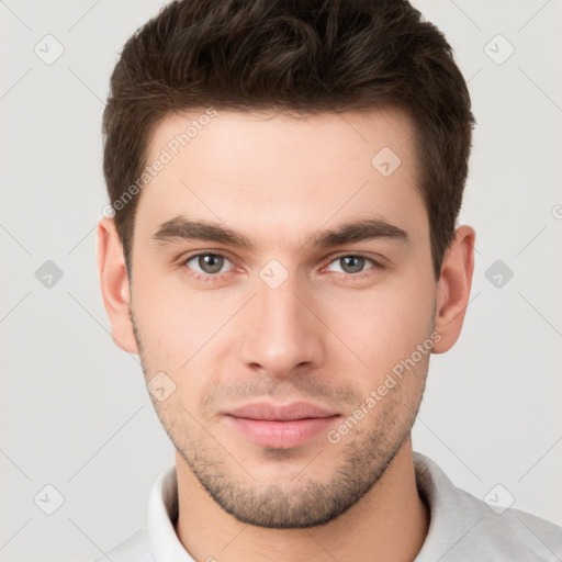 Neutral white young-adult male with short  brown hair and brown eyes