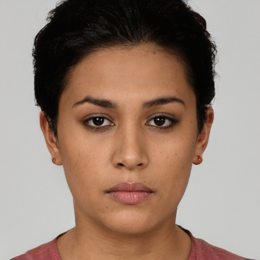 Neutral latino young-adult female with short  brown hair and brown eyes