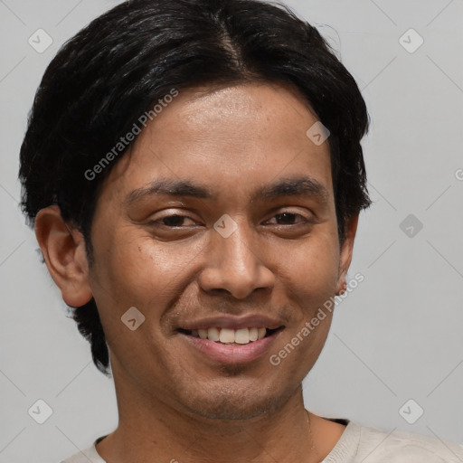 Joyful asian young-adult male with short  black hair and brown eyes