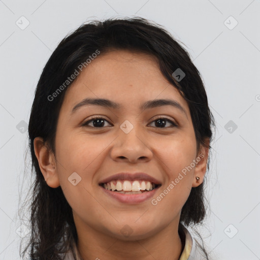 Joyful latino young-adult female with medium  brown hair and brown eyes