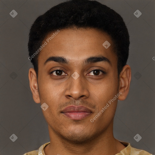 Joyful black young-adult male with short  brown hair and brown eyes