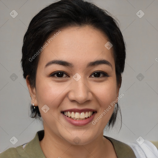 Joyful asian young-adult female with medium  brown hair and brown eyes