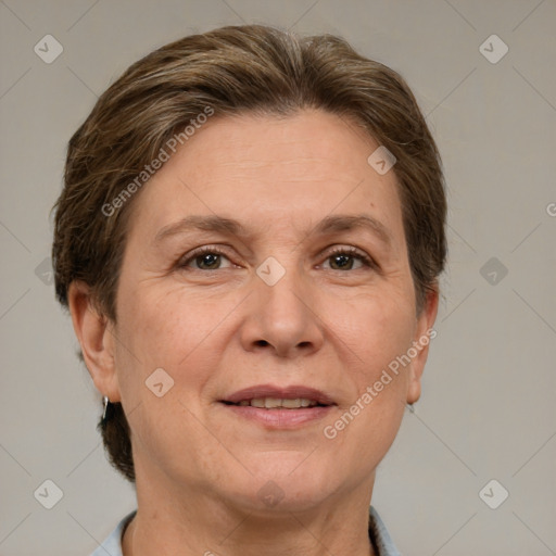 Joyful white adult female with short  brown hair and grey eyes