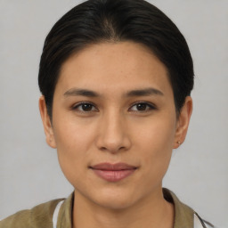 Joyful asian young-adult female with short  brown hair and brown eyes