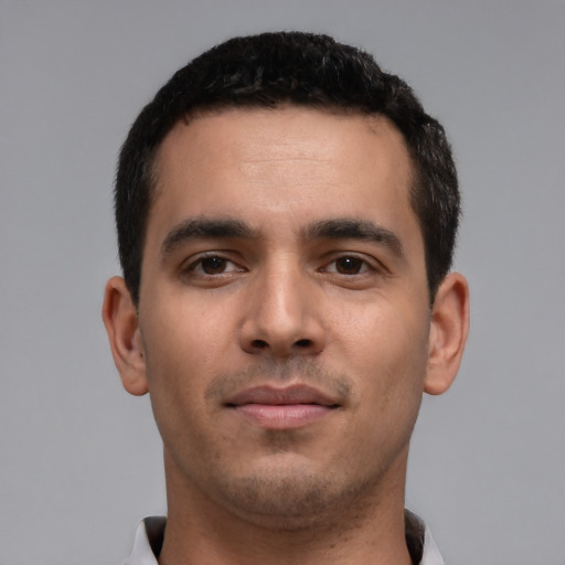 Neutral white young-adult male with short  black hair and brown eyes
