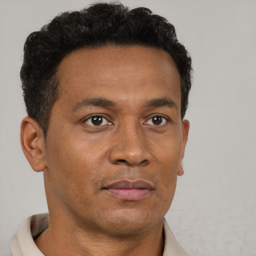 Neutral black adult male with short  brown hair and brown eyes