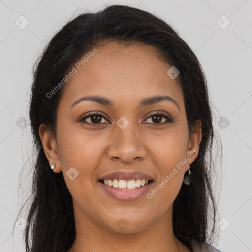 Joyful latino young-adult female with long  brown hair and brown eyes