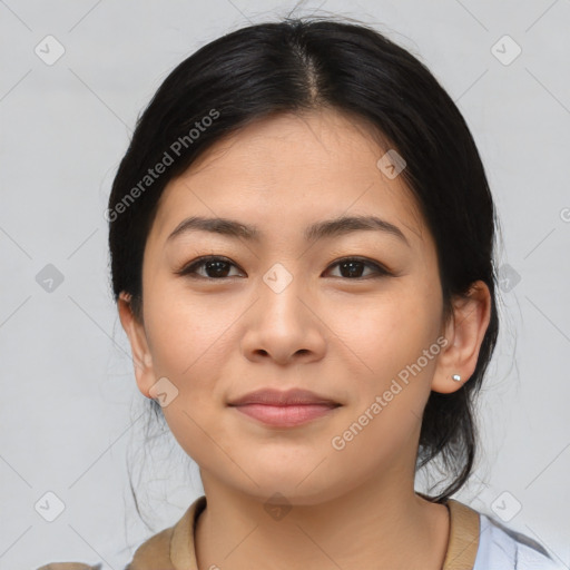 Joyful asian young-adult female with medium  black hair and brown eyes