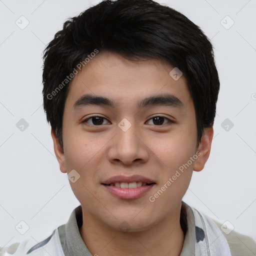Joyful asian young-adult male with short  black hair and brown eyes
