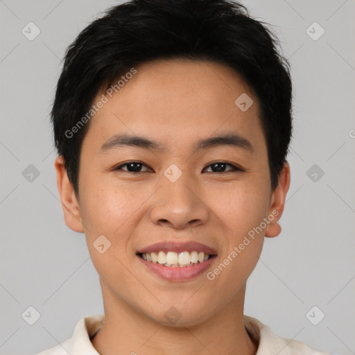 Joyful asian young-adult male with short  brown hair and brown eyes