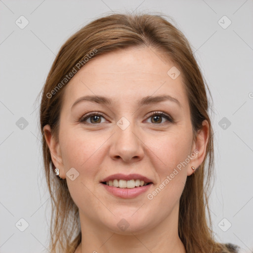 Joyful white young-adult female with long  brown hair and grey eyes