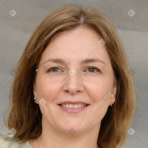 Joyful white adult female with medium  brown hair and brown eyes