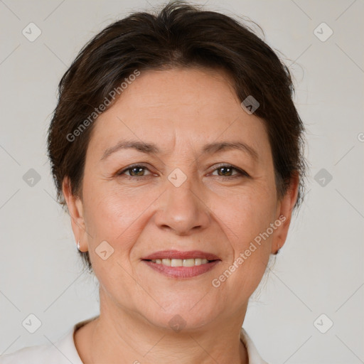 Joyful white adult female with short  brown hair and brown eyes