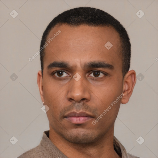 Neutral latino young-adult male with short  black hair and brown eyes