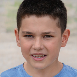 Joyful white child male with short  brown hair and brown eyes