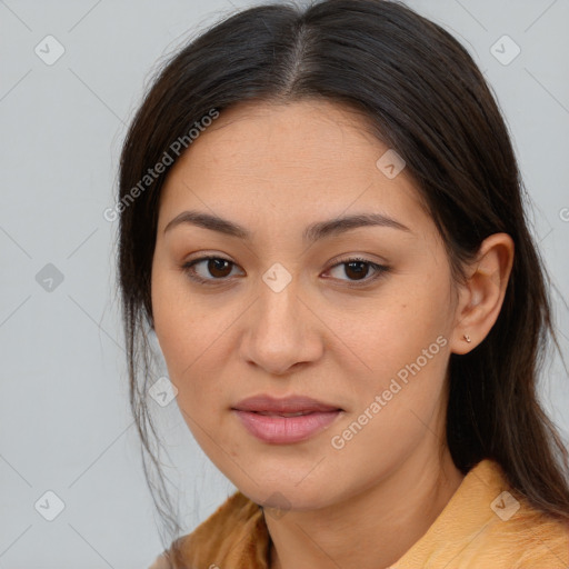 Joyful latino young-adult female with long  brown hair and brown eyes