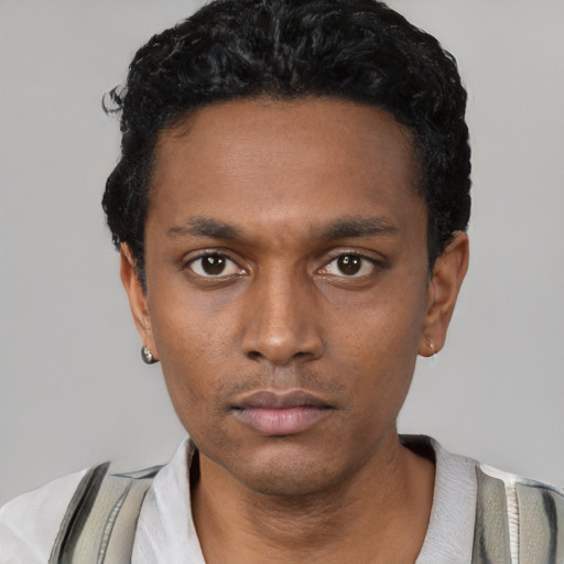 Neutral black young-adult male with short  black hair and brown eyes