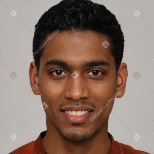 Joyful black young-adult male with short  black hair and brown eyes