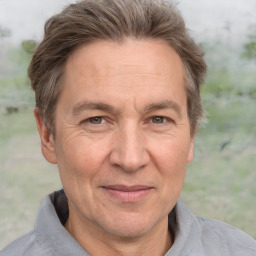 Joyful white middle-aged male with short  brown hair and brown eyes