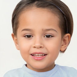 Joyful white child female with short  brown hair and brown eyes