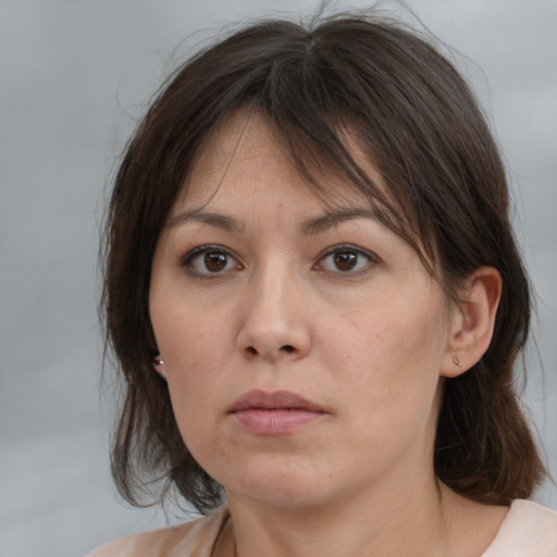Neutral white adult female with medium  brown hair and brown eyes