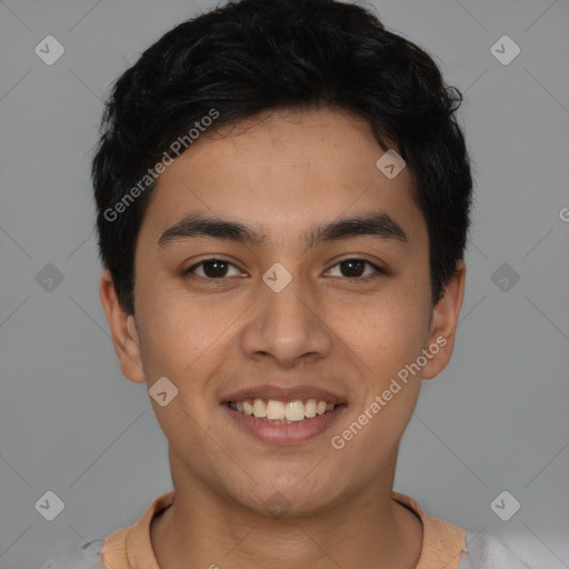 Joyful latino young-adult male with short  brown hair and brown eyes