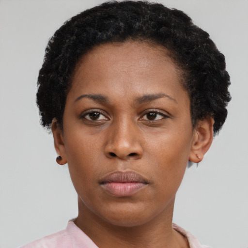 Neutral black young-adult female with short  black hair and brown eyes