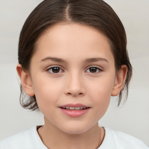 Joyful white child female with medium  brown hair and brown eyes