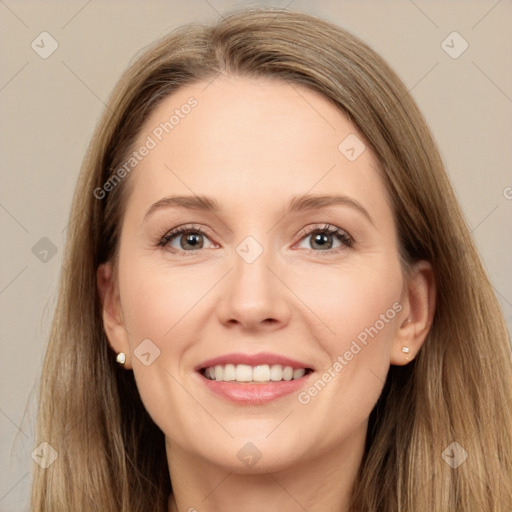 Joyful white young-adult female with long  brown hair and grey eyes