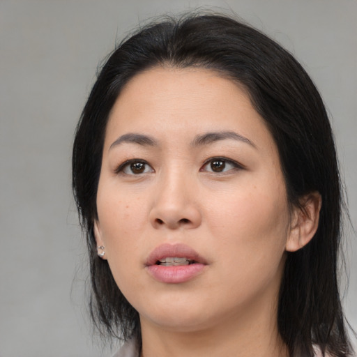 Neutral asian young-adult female with medium  black hair and brown eyes