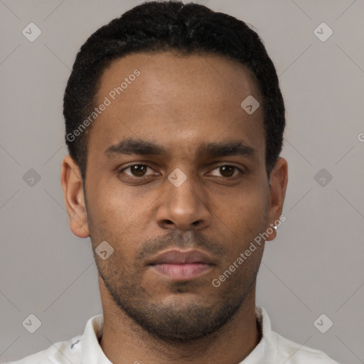 Neutral black young-adult male with short  black hair and brown eyes
