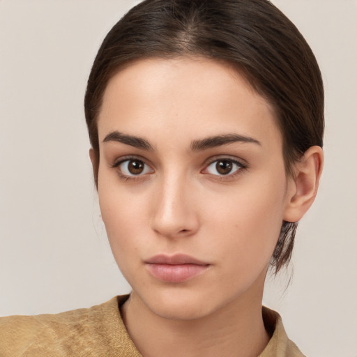 Neutral white young-adult female with medium  brown hair and brown eyes