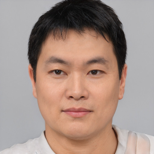 Neutral asian young-adult male with short  black hair and brown eyes
