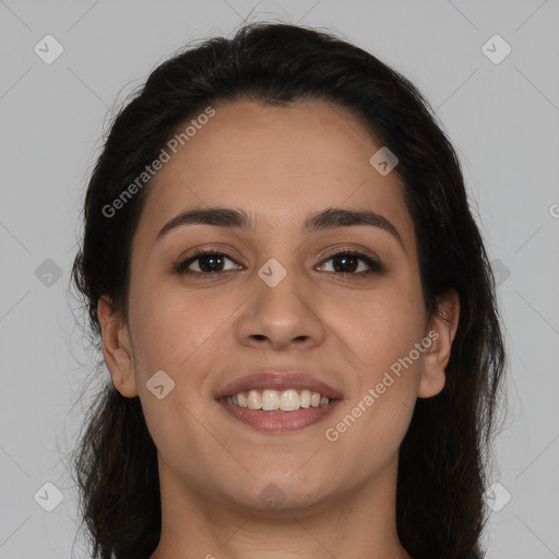 Joyful white young-adult female with long  brown hair and brown eyes