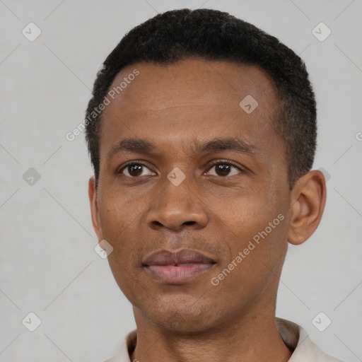 Neutral black young-adult male with short  black hair and brown eyes