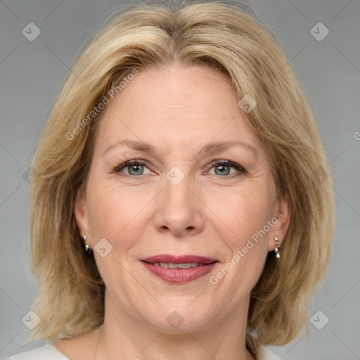 Joyful white adult female with medium  brown hair and grey eyes