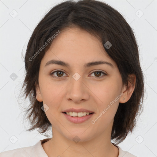 Joyful white young-adult female with medium  brown hair and brown eyes