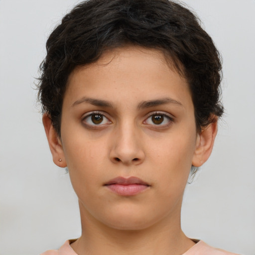 Neutral white young-adult female with short  brown hair and brown eyes