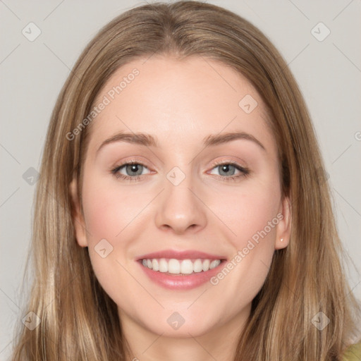 Joyful white young-adult female with long  brown hair and grey eyes