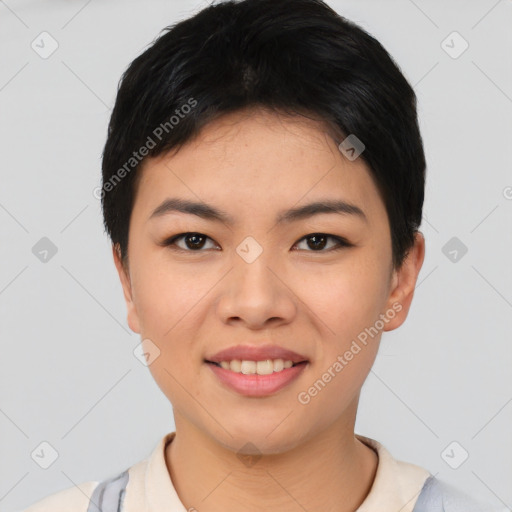 Joyful asian young-adult female with short  black hair and brown eyes