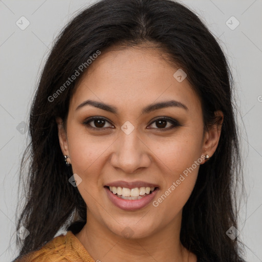 Joyful latino young-adult female with long  brown hair and brown eyes