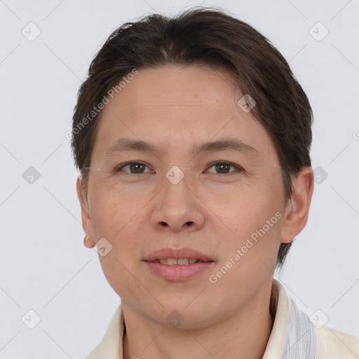 Joyful white adult female with short  brown hair and brown eyes