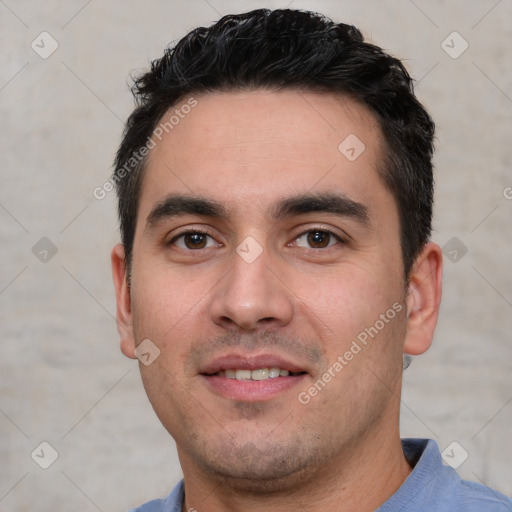 Joyful white young-adult male with short  black hair and brown eyes