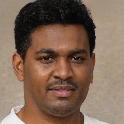Neutral black young-adult male with short  brown hair and brown eyes