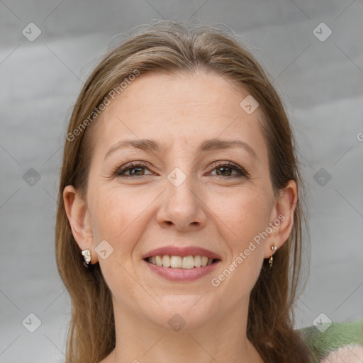 Joyful white adult female with medium  brown hair and grey eyes