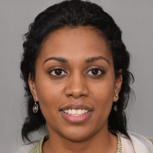 Joyful latino young-adult female with long  black hair and brown eyes
